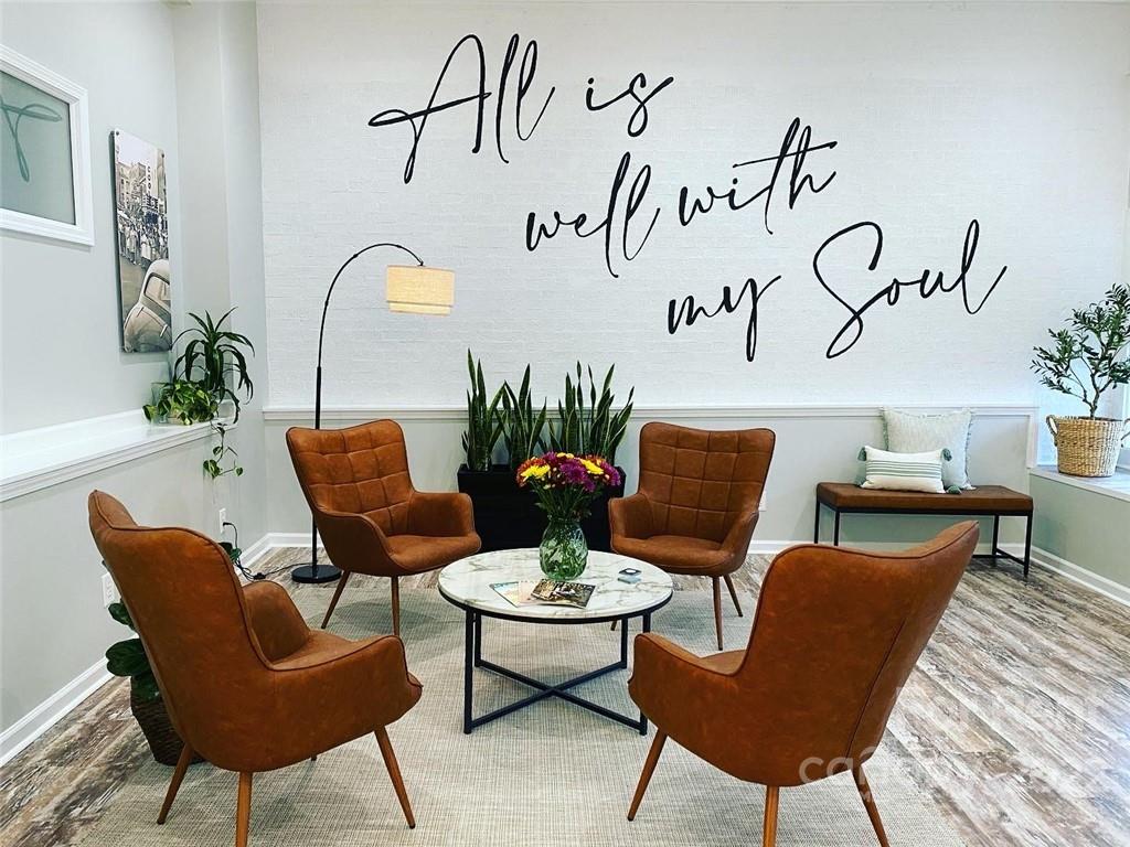 227 East Main Street, Unit SUITE C Lincolnton, NC 28092 - Photo 2 of 4 a view of a livingroom with furniture and kitchen