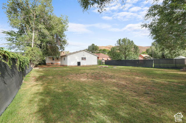 154 South State Street Morgan, UT 84050 - Photo 24 of 25 Expansive green space with a privacy fence