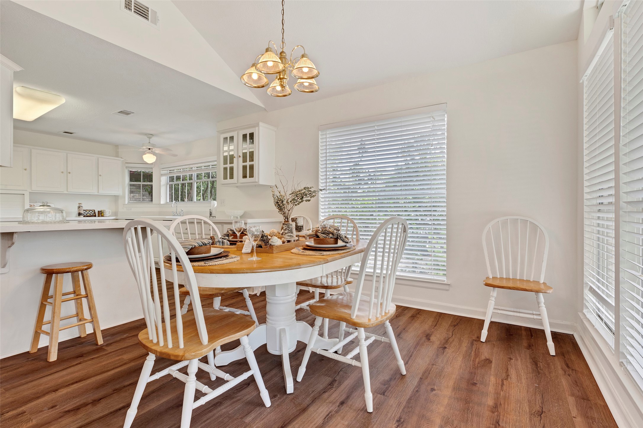 281 Harbor Run Drive Coldspring, TX 77331 - Photo 15 of 31 a view of a dining room with furniture wooden floor and chandelier