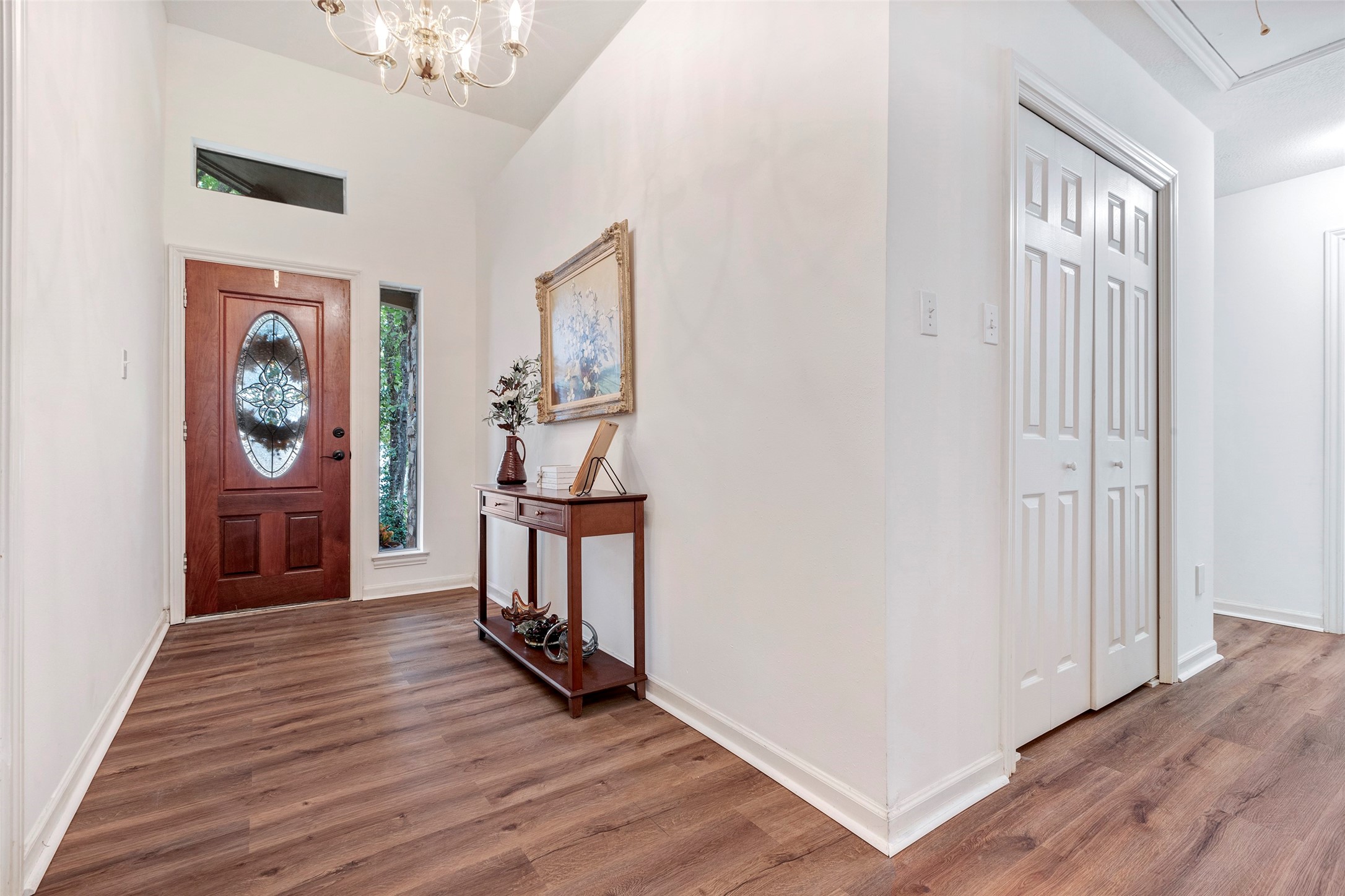 281 Harbor Run Drive Coldspring, TX 77331 - Photo 5 of 31 an empty room with wooden floor and windows