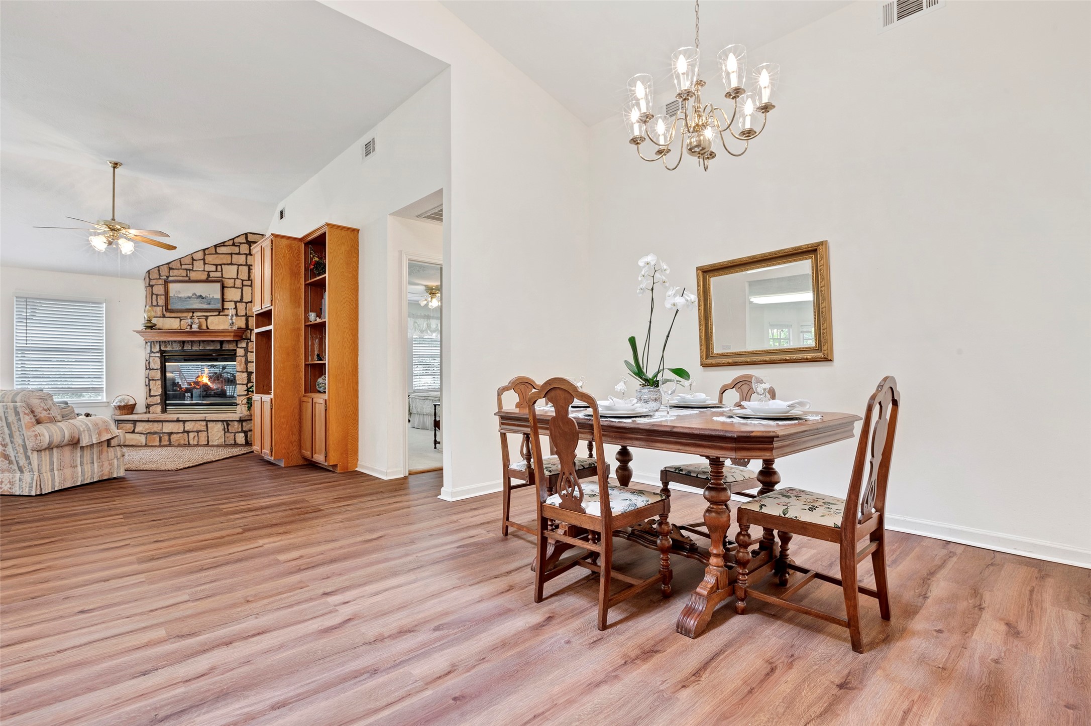 281 Harbor Run Drive Coldspring, TX 77331 - Photo 6 of 31 a view of a dining room with furniture and wooden floor