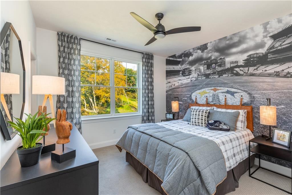 5136 Cline Hollow Road Export, PA 15632 - Photo 20 of 25 a bedroom with a bed a potted plant and a large window