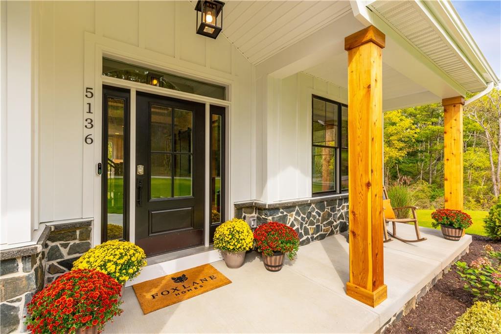 5136 Cline Hollow Road Export, PA 15632 - Photo 2 of 25 a bedroom with furniture and large windows