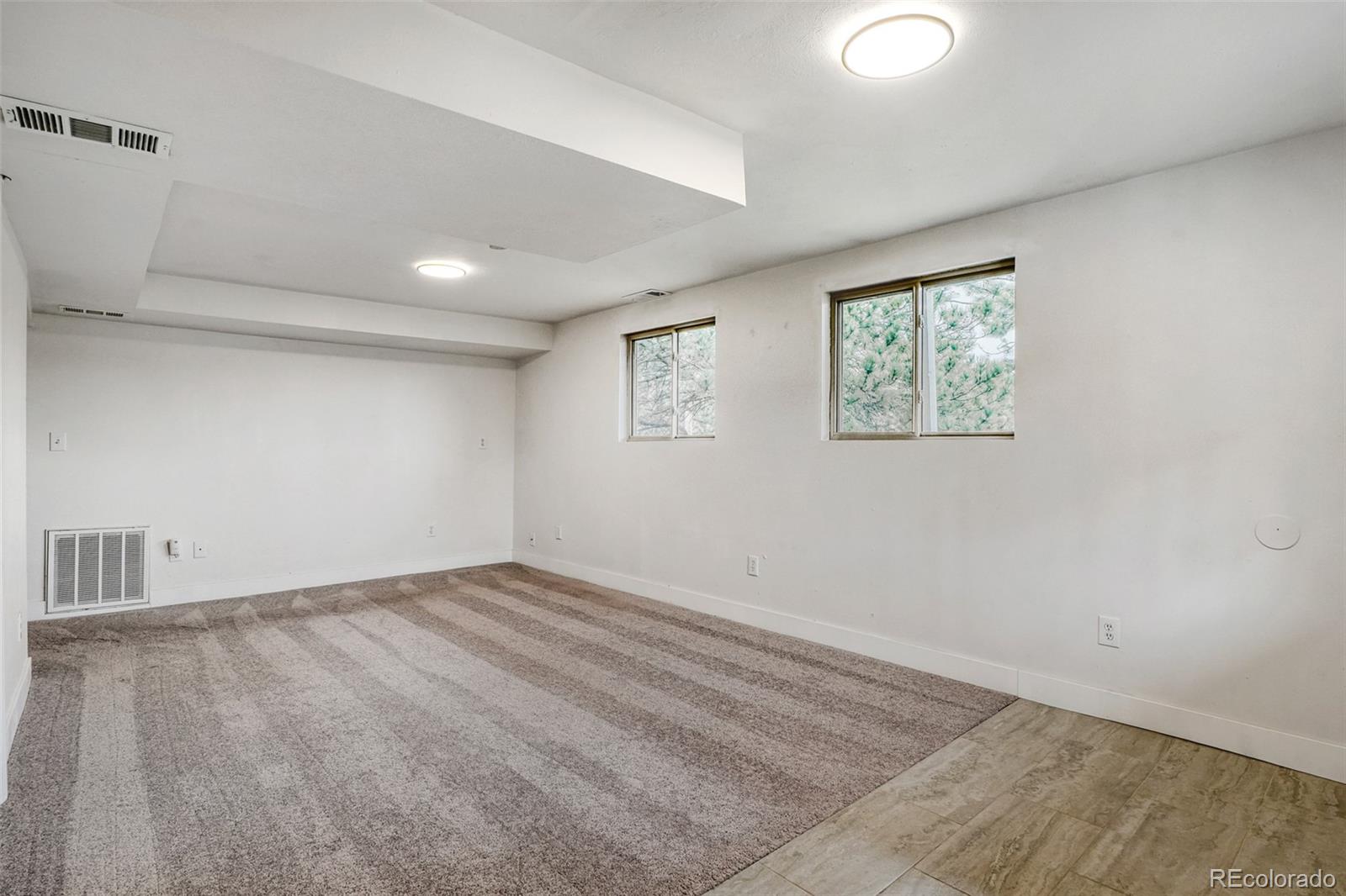 26207 South End Road Kittredge, CO 80457 - Photo 16 of 32 an empty room with windows