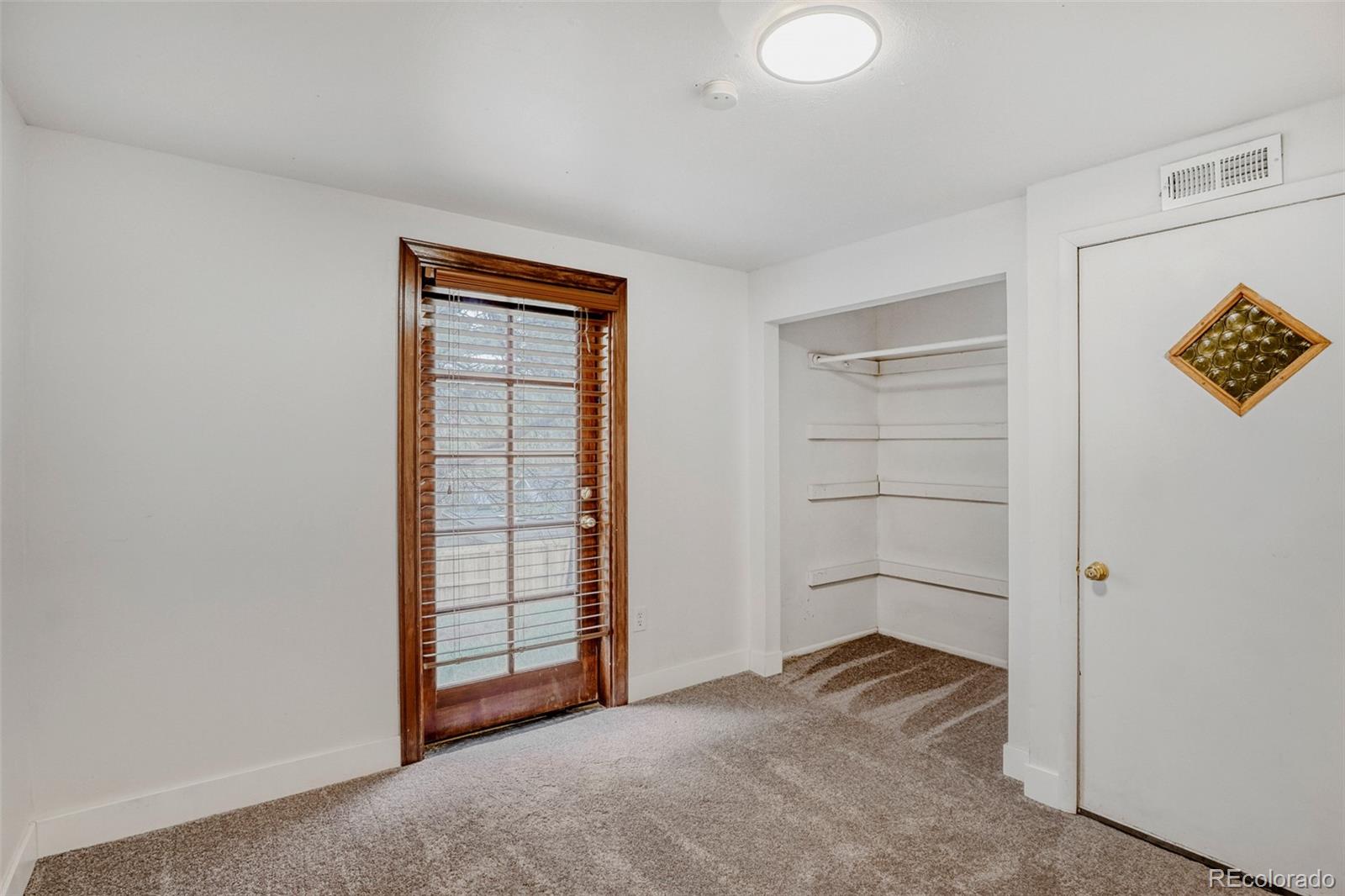26207 South End Road Kittredge, CO 80457 - Photo 22 of 32 a view of an empty room and closet area
