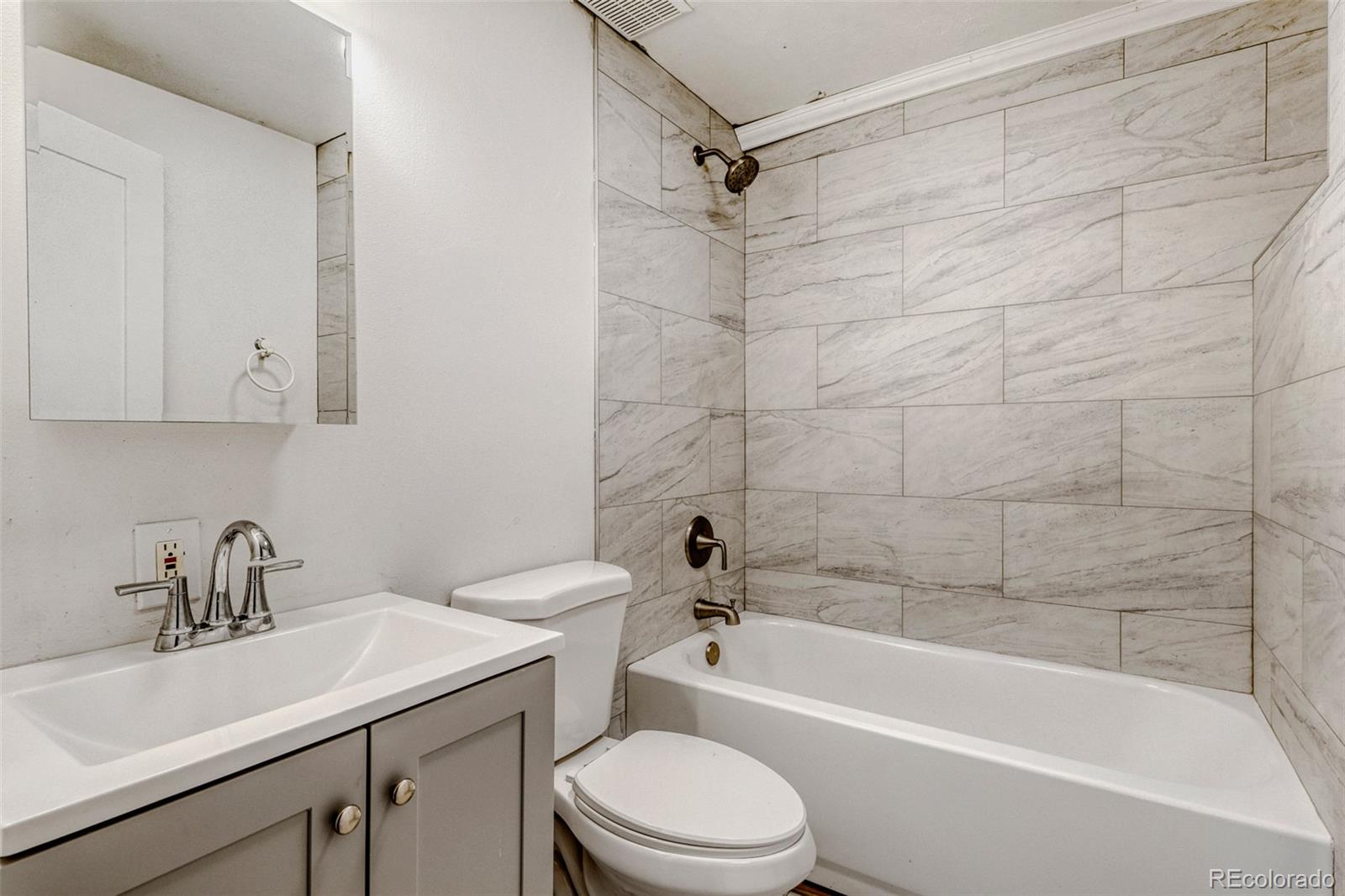 26207 South End Road Kittredge, CO 80457 - Photo 24 of 32 a bathroom with a sink toilet and bathtub