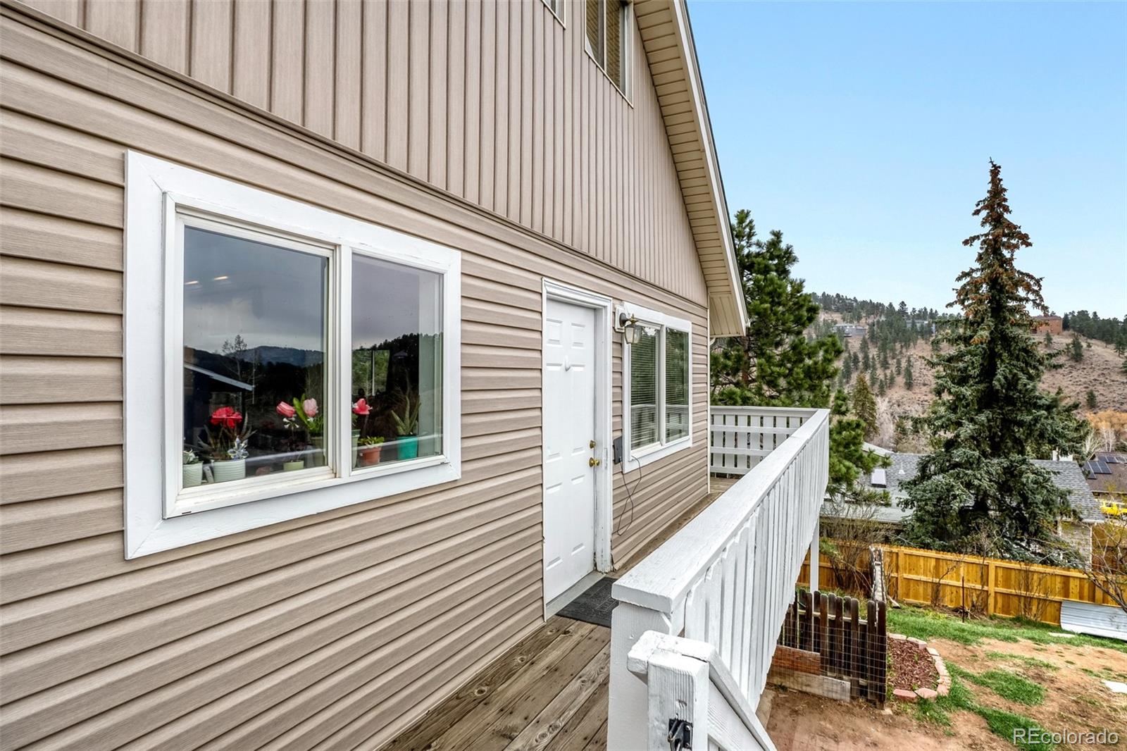26207 South End Road Kittredge, CO 80457 - Photo 27 of 32 a view of a balcony with small garden