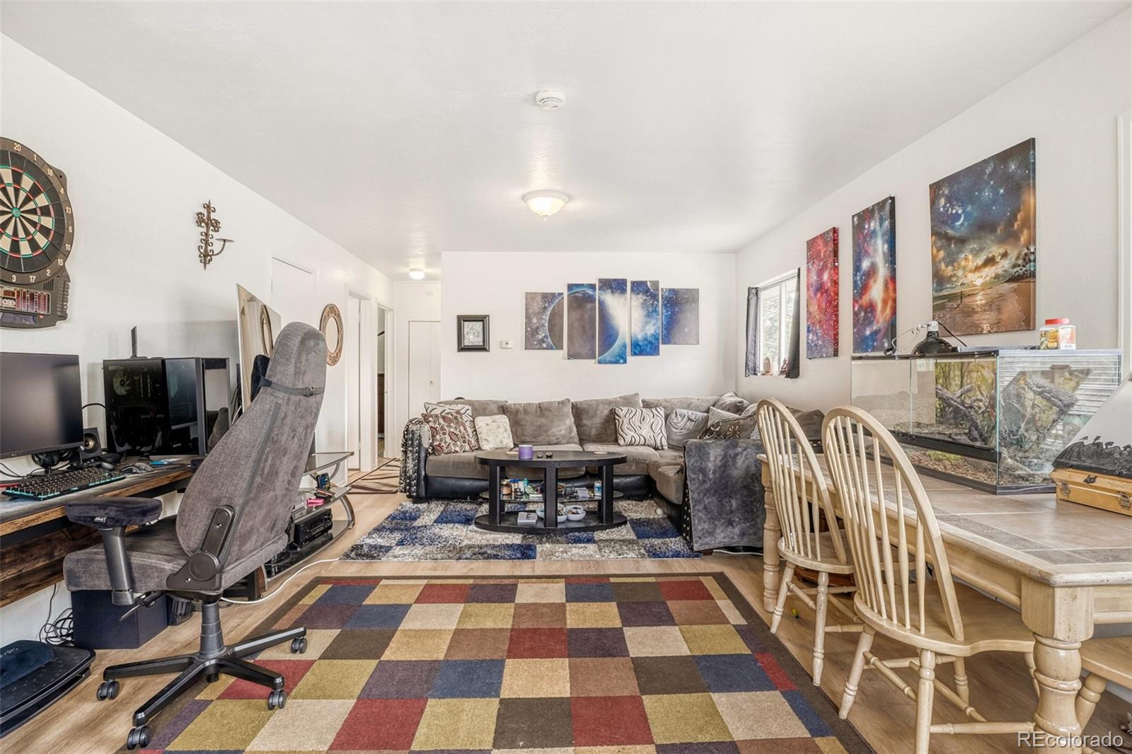 26207 South End Road Kittredge, CO 80457 - Photo 5 of 32 a very nice looking room with a couch