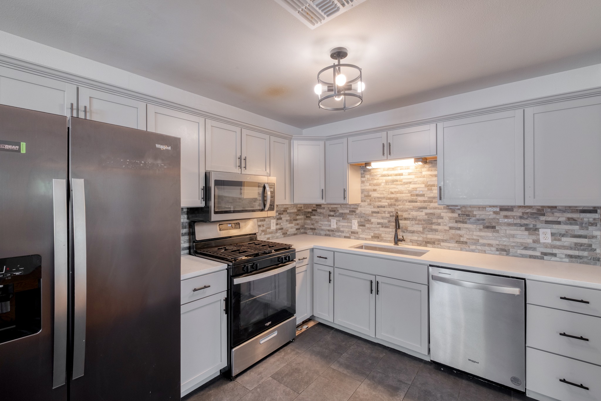 1719 Adina Street Austin, TX 78721 - Photo 9 of 17 Stainless Steel appliances and the refrigerator is included.