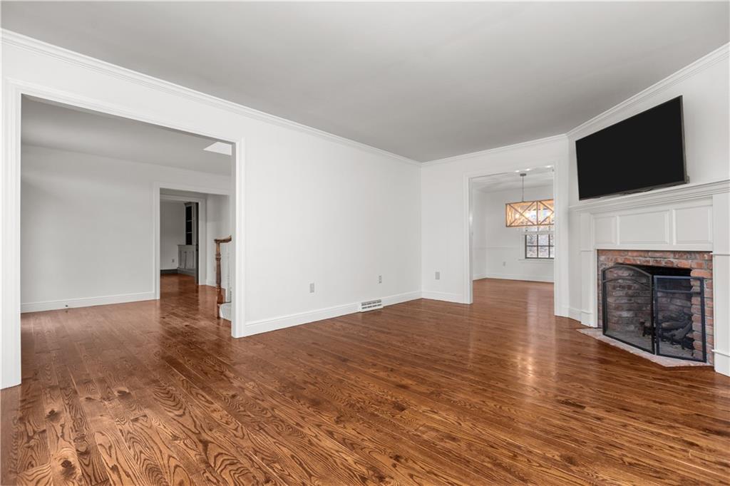 500 Davis School Road Washington, PA 15301 - Photo 14 of 48 a view of empty room with wooden floor and fireplace