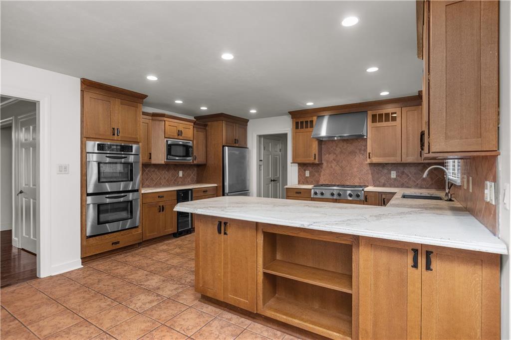 500 Davis School Road Washington, PA 15301 - Photo 19 of 48 a kitchen with a refrigerator and a sink