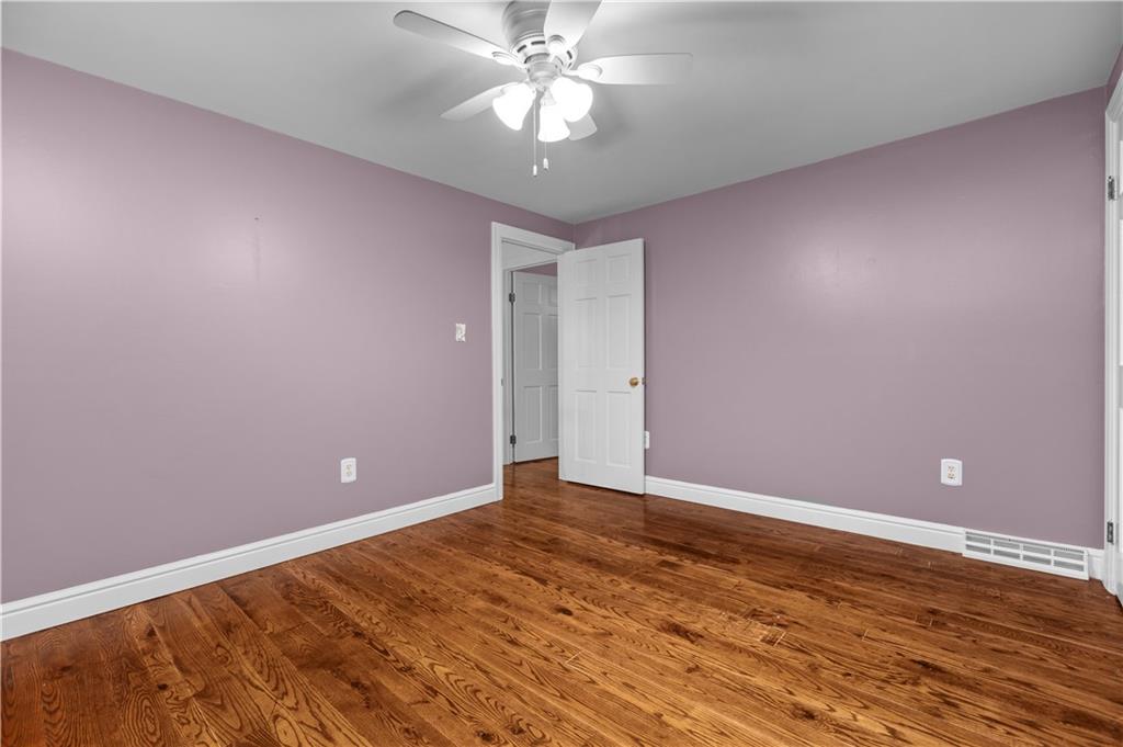 500 Davis School Road Washington, PA 15301 - Photo 30 of 48 a view of an empty room with window and chandelier fan