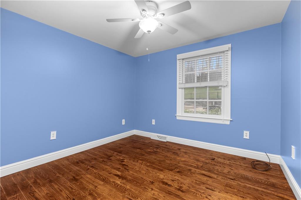 500 Davis School Road Washington, PA 15301 - Photo 33 of 48 wooden floor in an empty room with a window