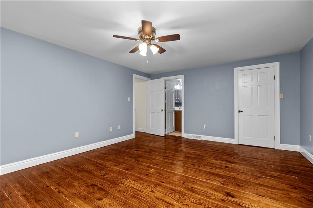 500 Davis School Road Washington, PA 15301 - Photo 37 of 48 a view of an empty room with wooden floor