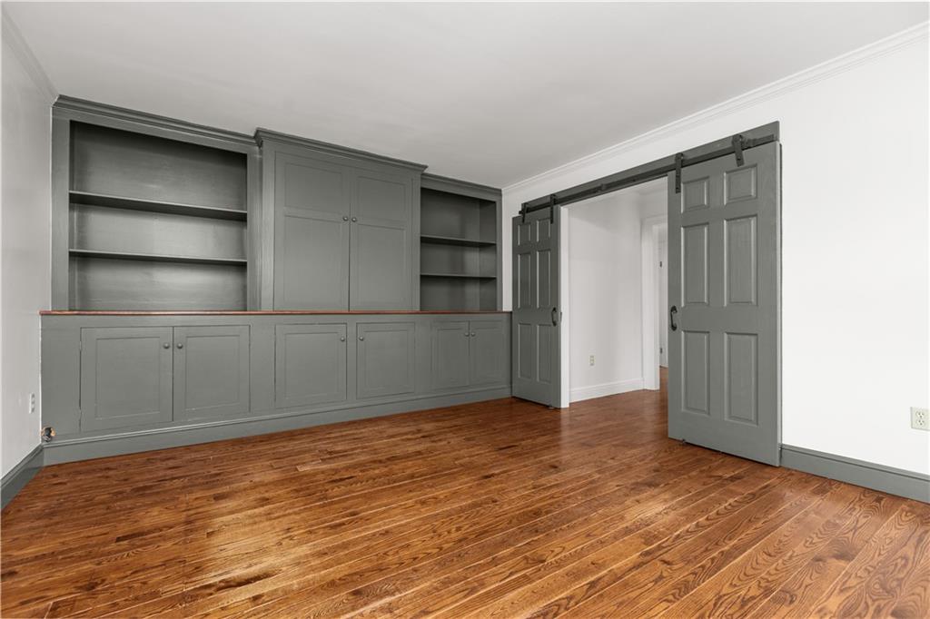 500 Davis School Road Washington, PA 15301 - Photo 9 of 48 a view of an empty room with closet and wooden floor