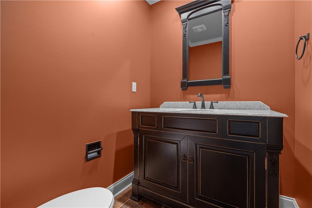 500 Davis School Road Washington, PA 15301 - Photo 10 of 48 a bathroom with a sink vanity mirror and toilet