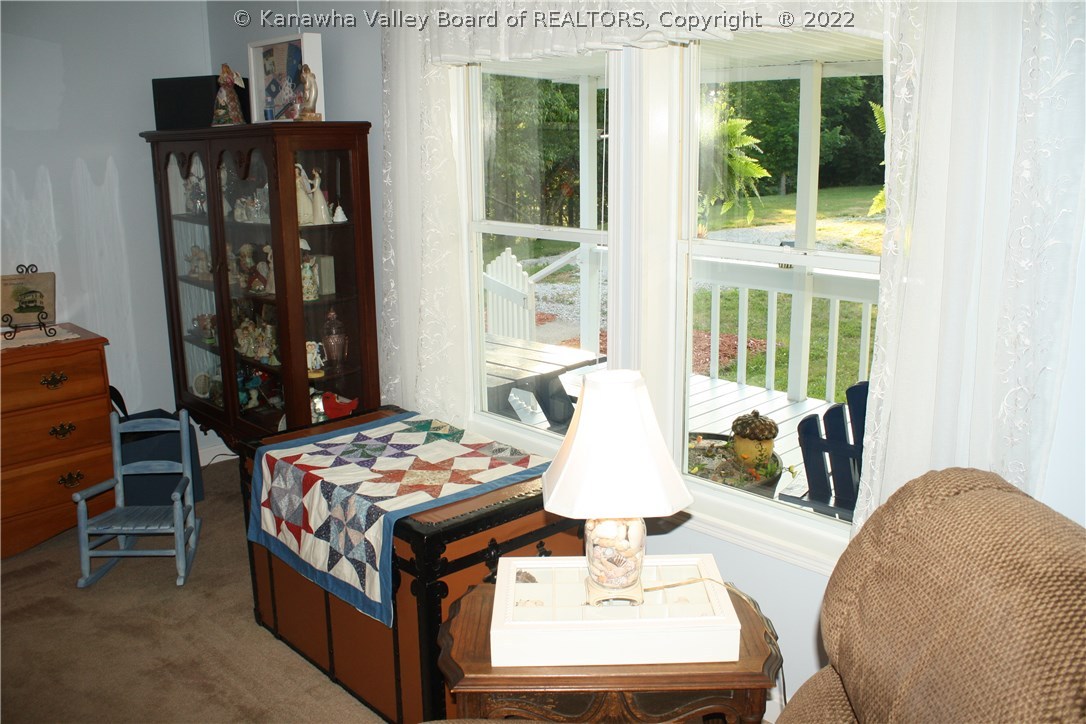 249 White Pine Road Kenna, WV 25248 - Photo 15 of 26 Living room looking out onto covered front porch