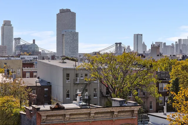 a view of a city with tall buildings