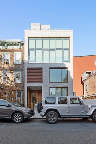 a car parked in front of a building