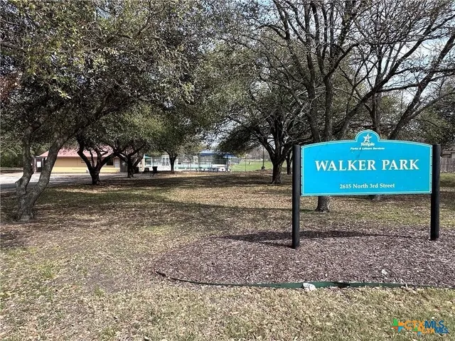 a sign on the side of the road