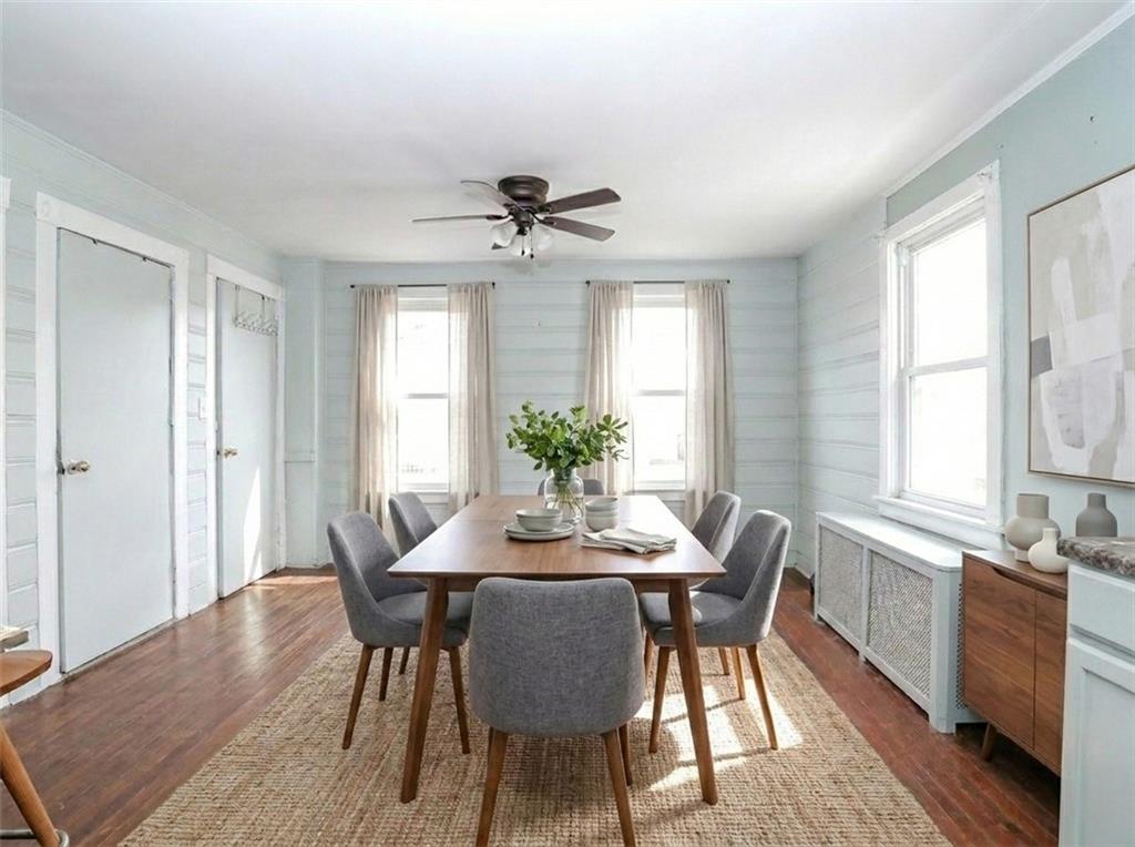 636 Holmdel Road Hazlet, NJ 07730 - Photo 19 of 47 a view of a a dining room with furniture window and wooden floor
