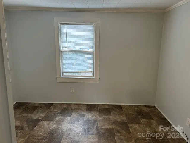 a view of a room with an empty space