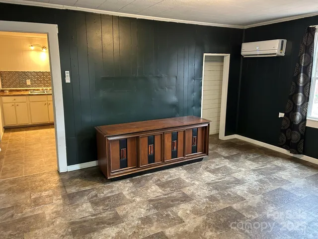 a kitchen with a sink stove and refrigerator