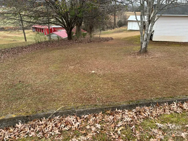 a view of entryway with wooden stairs