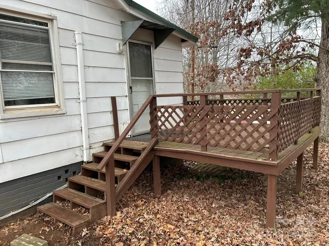 a house with trees in the background