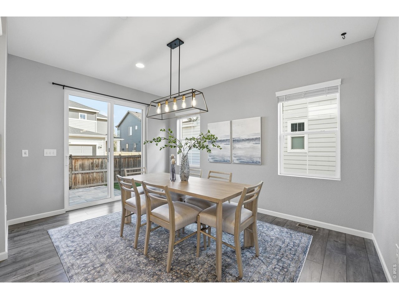 10094 Flower Street Broomfield, CO 80021 - Photo 12 of 40 a view of a dining room with furniture window and outside view