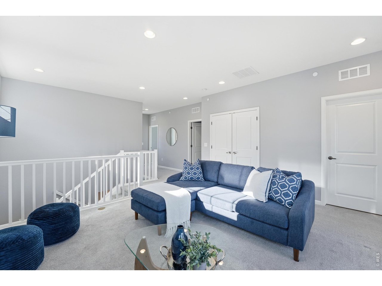 10094 Flower Street Broomfield, CO 80021 - Photo 19 of 40 a living room with furniture and a couch