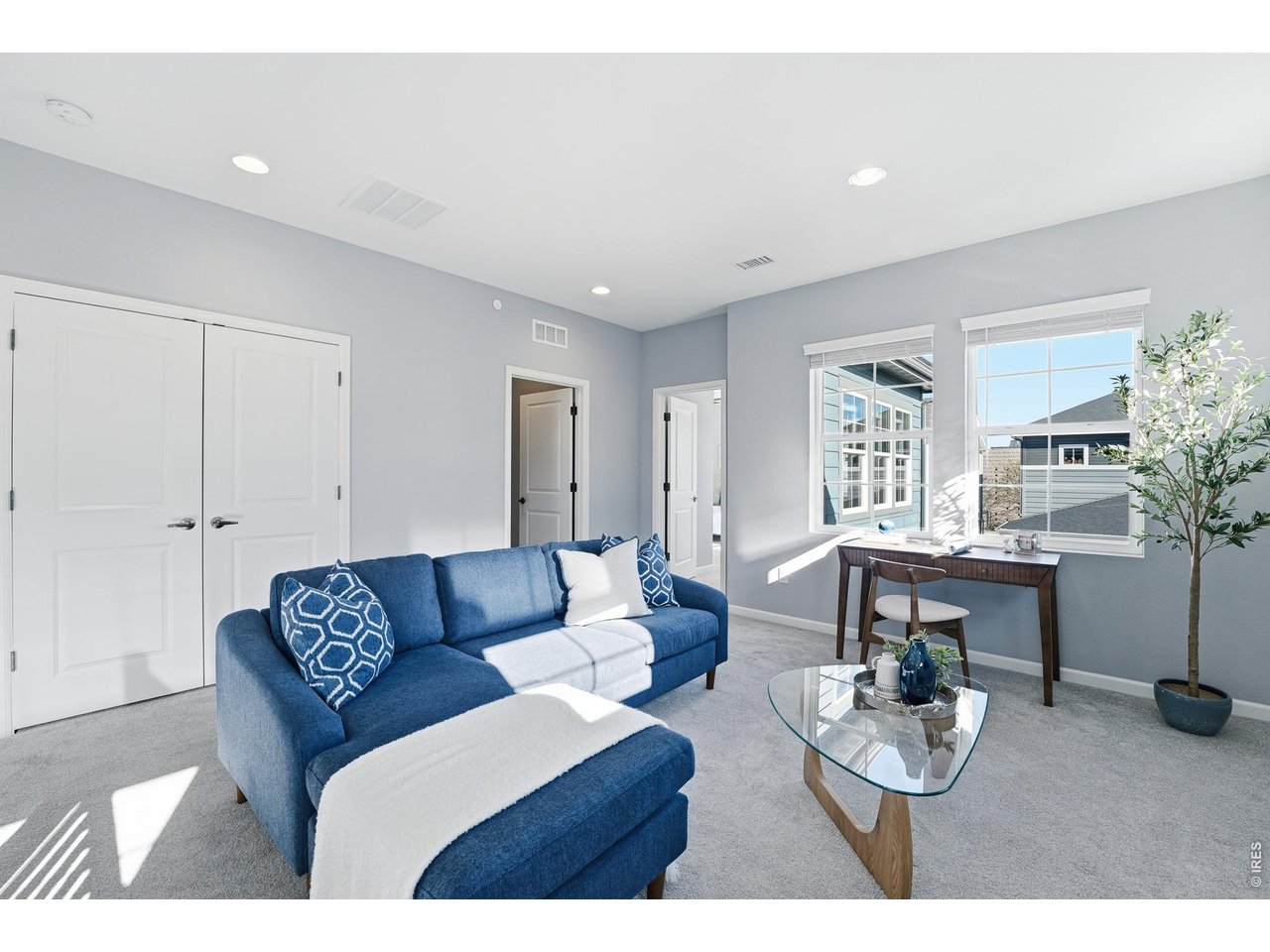 10094 Flower Street Broomfield, CO 80021 - Photo 20 of 40 a living room with furniture and a table