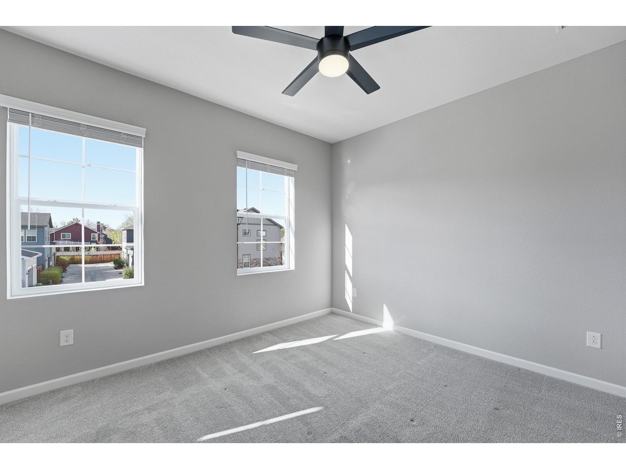 10094 Flower Street Broomfield, CO 80021 - Photo 26 of 40 a view of an empty room with a window