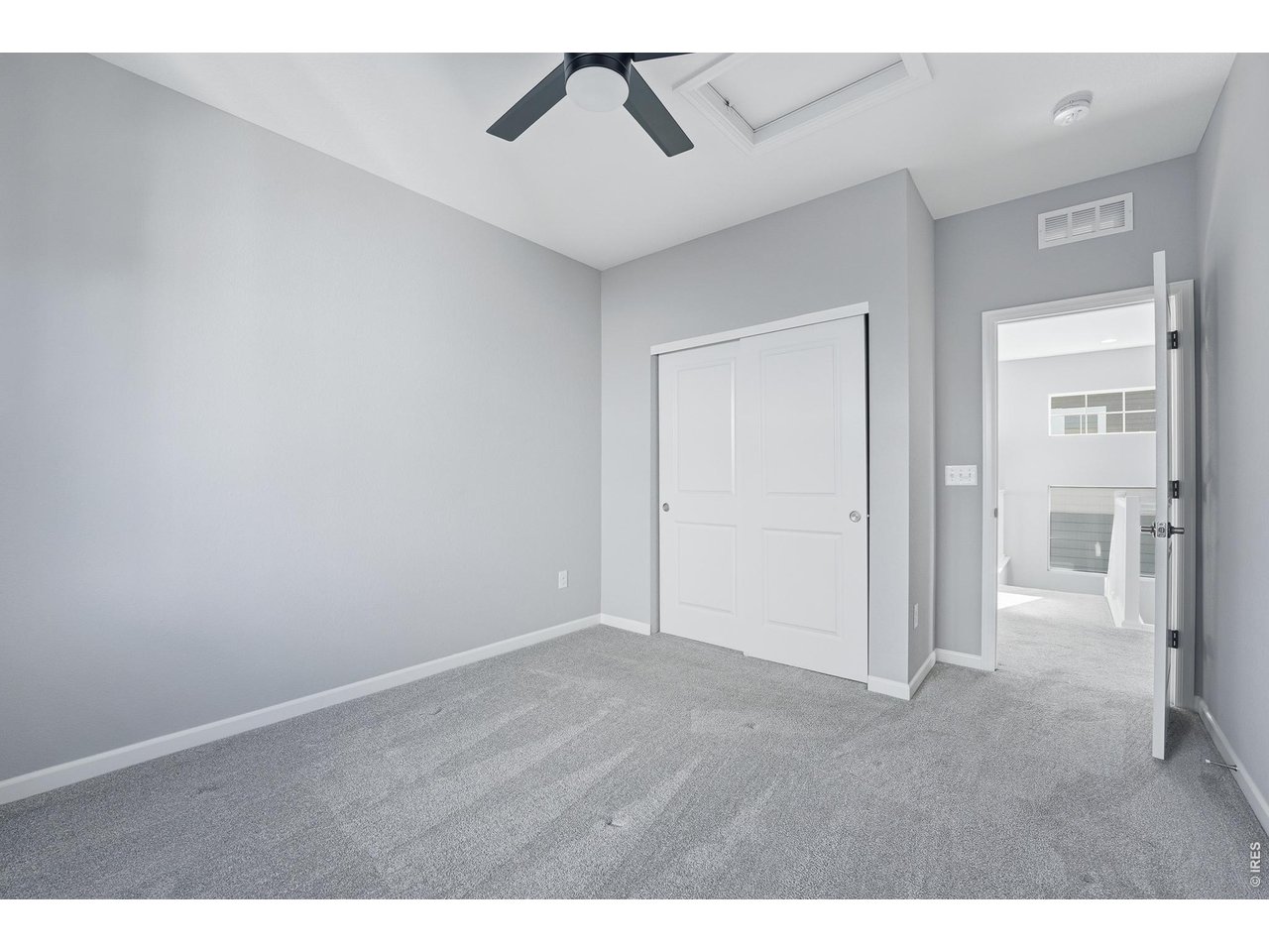 10094 Flower Street Broomfield, CO 80021 - Photo 32 of 40 a view of an empty room and window