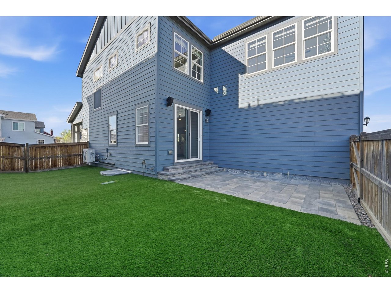 10094 Flower Street Broomfield, CO 80021 - Photo 36 of 40 a view of a backyard with wooden fence