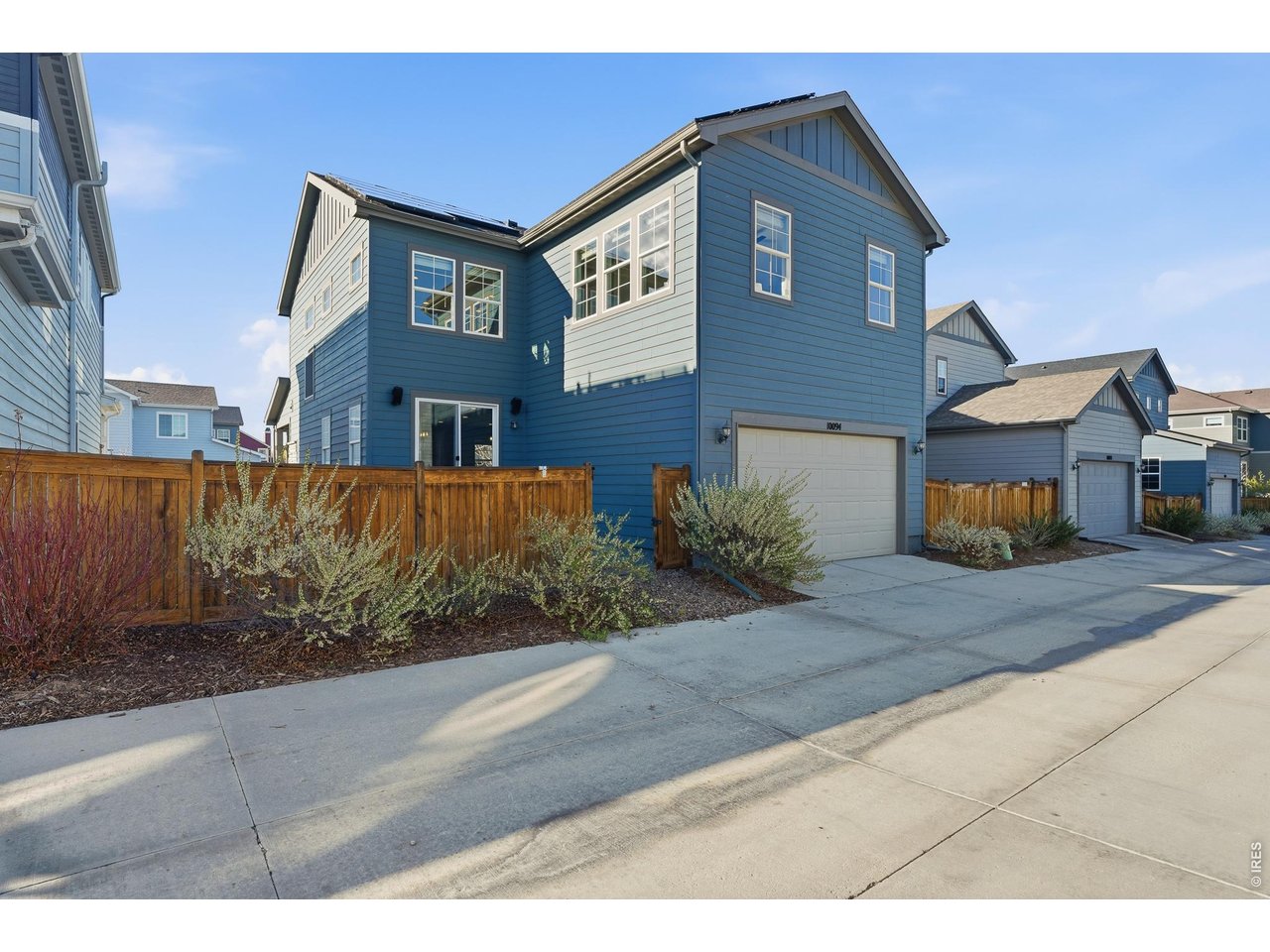 10094 Flower Street Broomfield, CO 80021 - Photo 38 of 40 a front view of a house with a yard