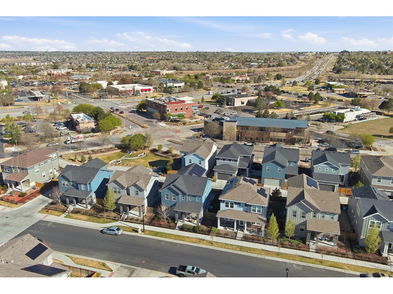 10094 Flower Street Broomfield, CO 80021 - Photo 40 of 40 an aerial view of residential houses with outdoor space