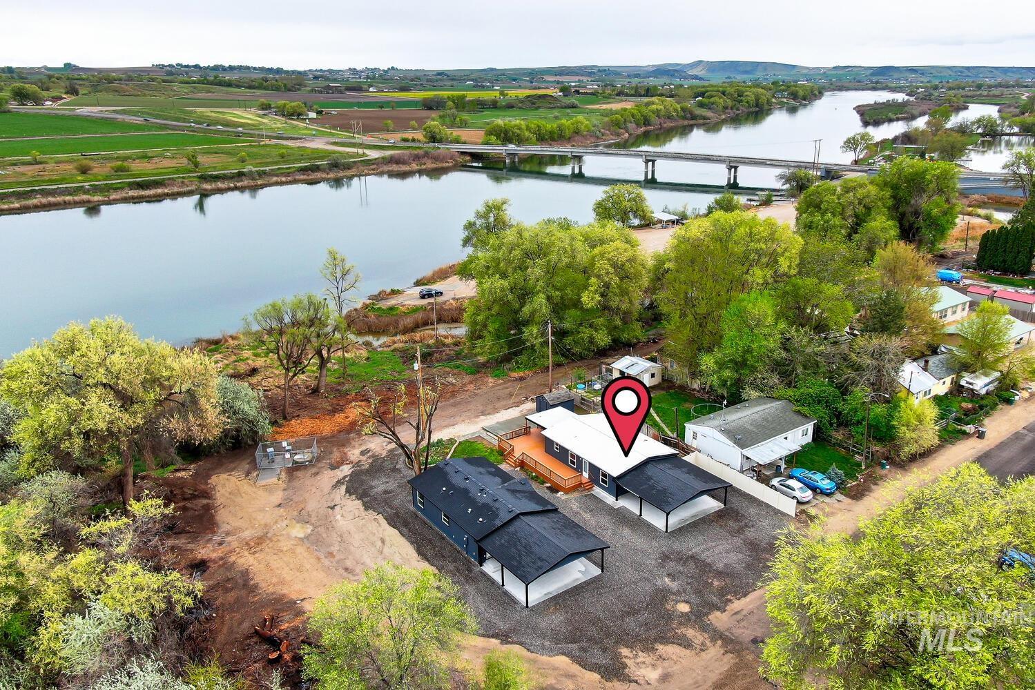 162 1st Street North Marsing, ID 83639 - Photo 1 of 39 Bird's eye view of a nearby body of water and a notable bridge
