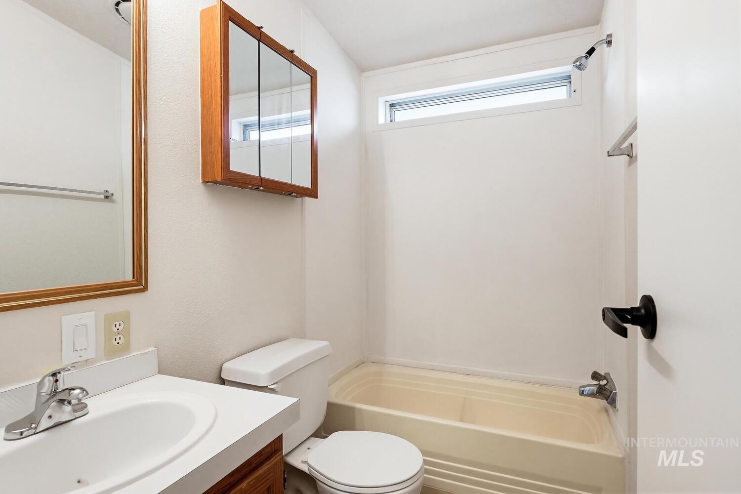 162 1st Street North Marsing, ID 83639 - Photo 22 of 39 Bathroom featuring vanity and shower combination