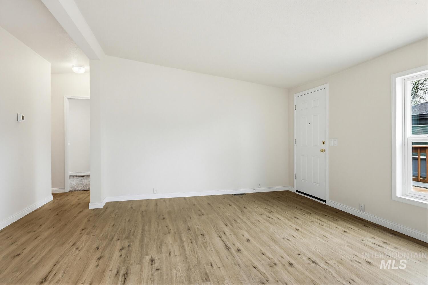 162 1st Street North Marsing, ID 83639 - Photo 7 of 39 Spare room featuring light wood-style floors