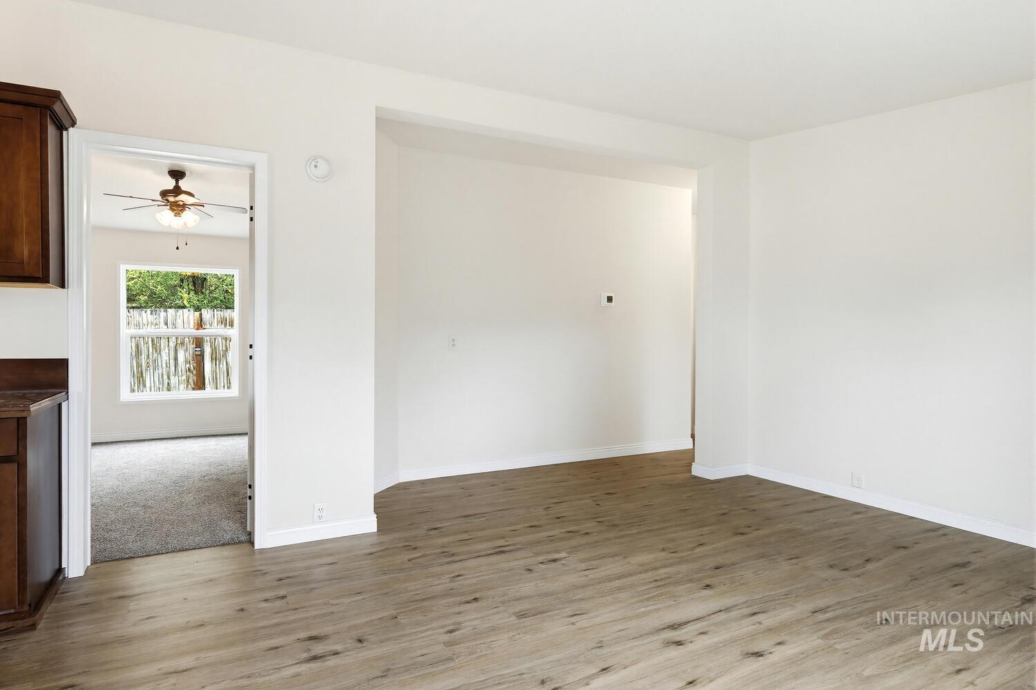 162 1st Street North Marsing, ID 83639 - Photo 8 of 39 Spare room featuring light wood-style flooring and ceiling fan