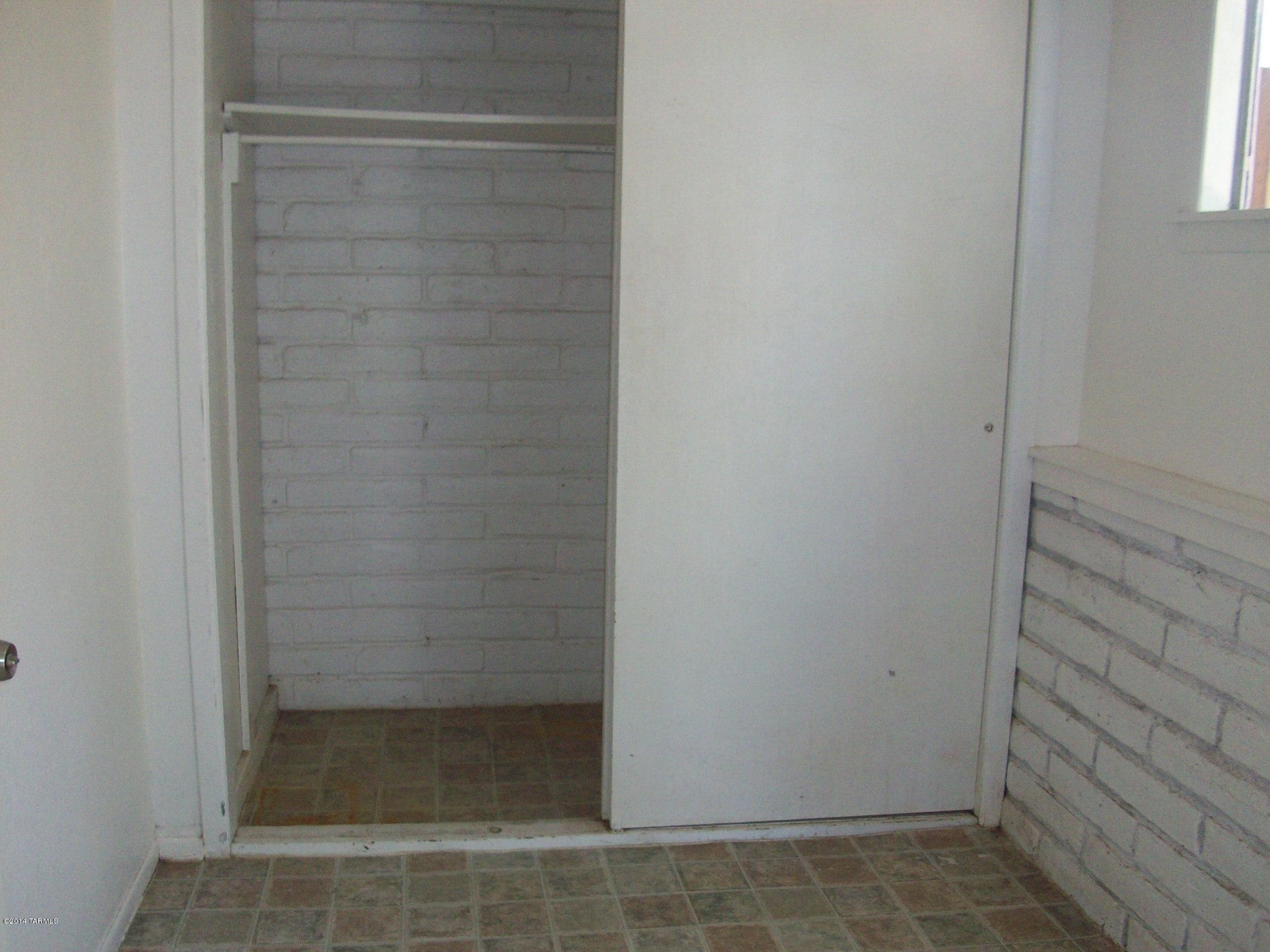 1161 Hodges Circle Rio Rico, AZ 85648 - Photo 5 of 23 a bathroom with a glass door