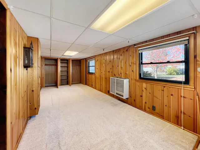 a kitchen that has a sink and a stove