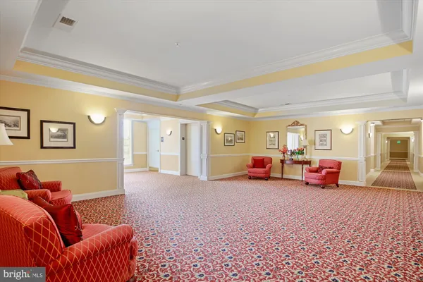 a view of a livingroom with furniture and a couch