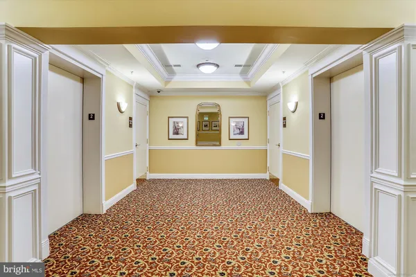 wooden floor in a hall with an entryway