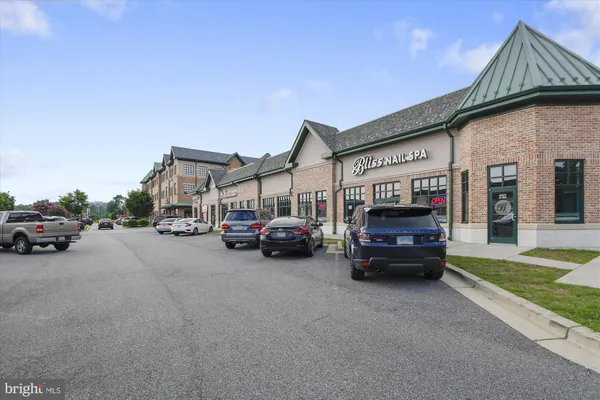a view of a car park in front of house