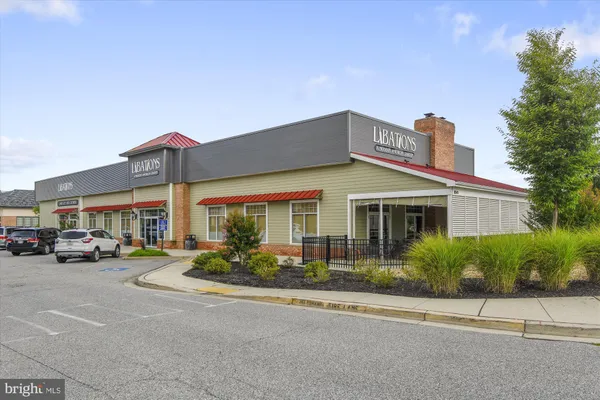 a front view of a building with street view