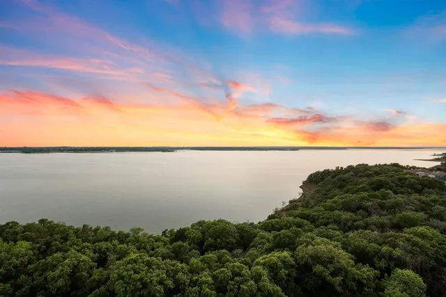 a view of a lake from a yard