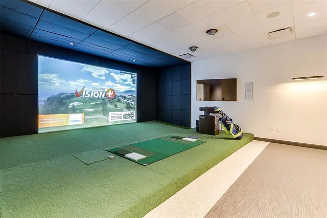 a living room with a flat screen tv