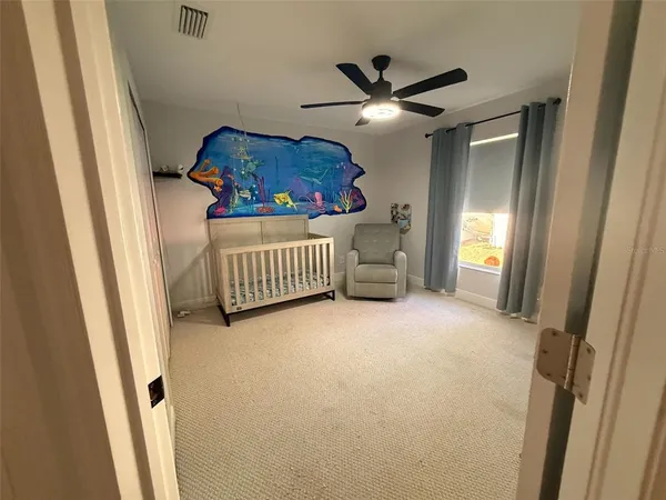 a view of livingroom with furniture and windows